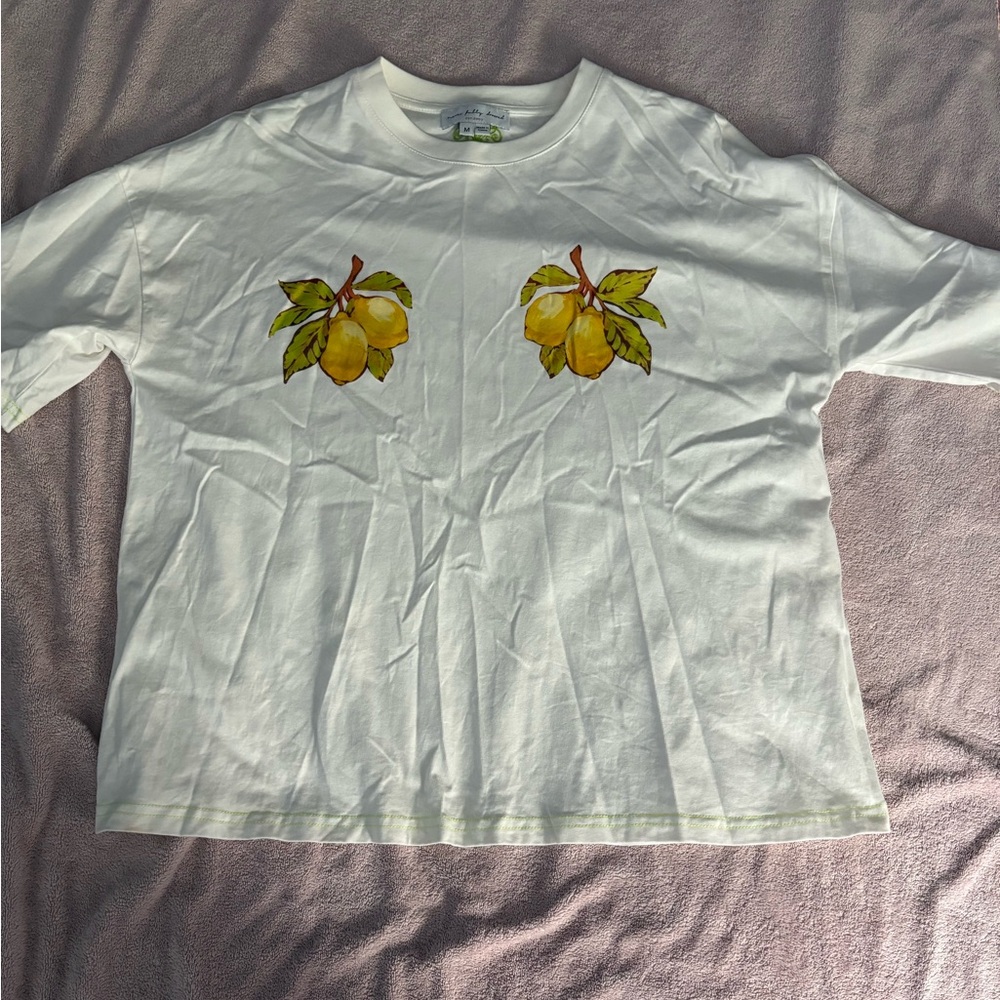 Never Fully Dressed White Tee with Yellow Fruit Design